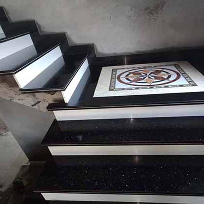 cầu thang đá hoa cương nhà phố